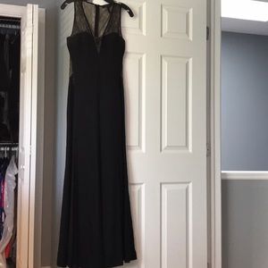 Beautiful BCBG black gown with lace detail.